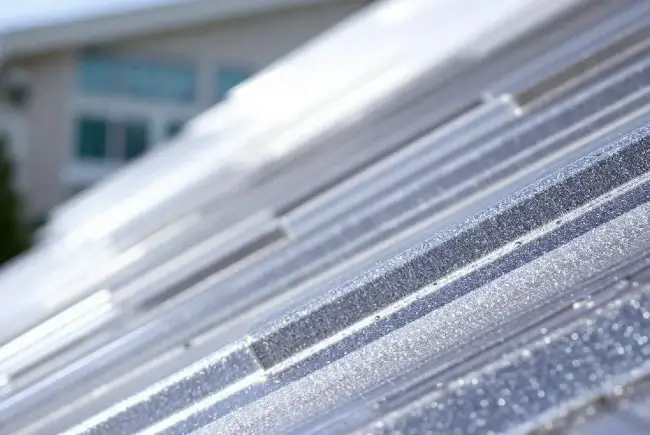 a close up image of a metal roofing system