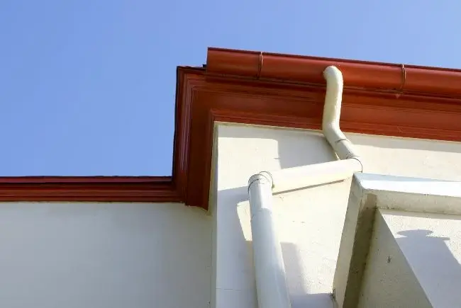 white downspouts