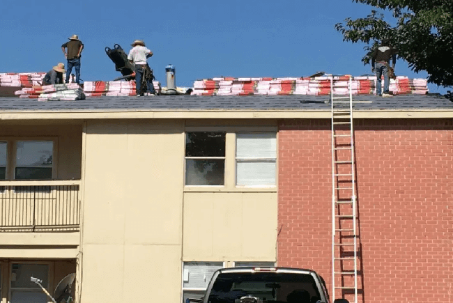 maupin roofing team installing a roof