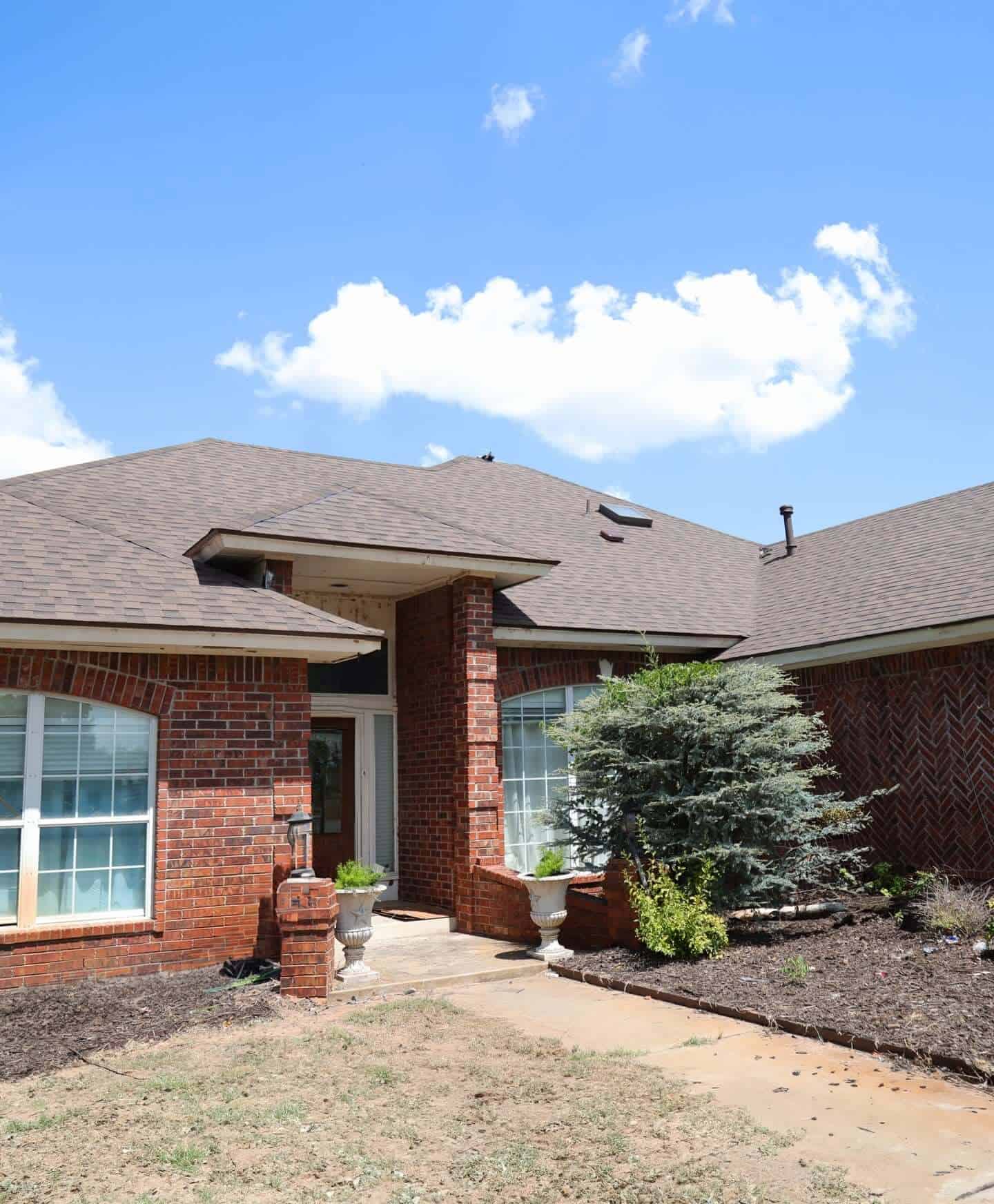 Completed roof replacement brick ranch home, a Maupin Roofing & Construction job
