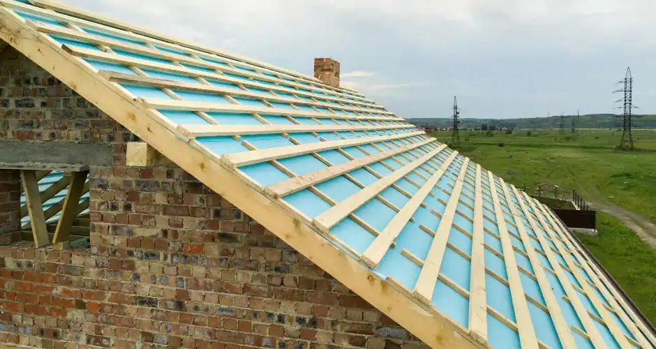 newly built house with roof skeleton installed