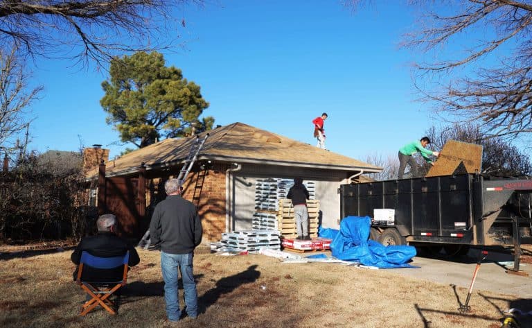 Roof replacement tear off homeowner watching, a Maupin Roofing & Construction job